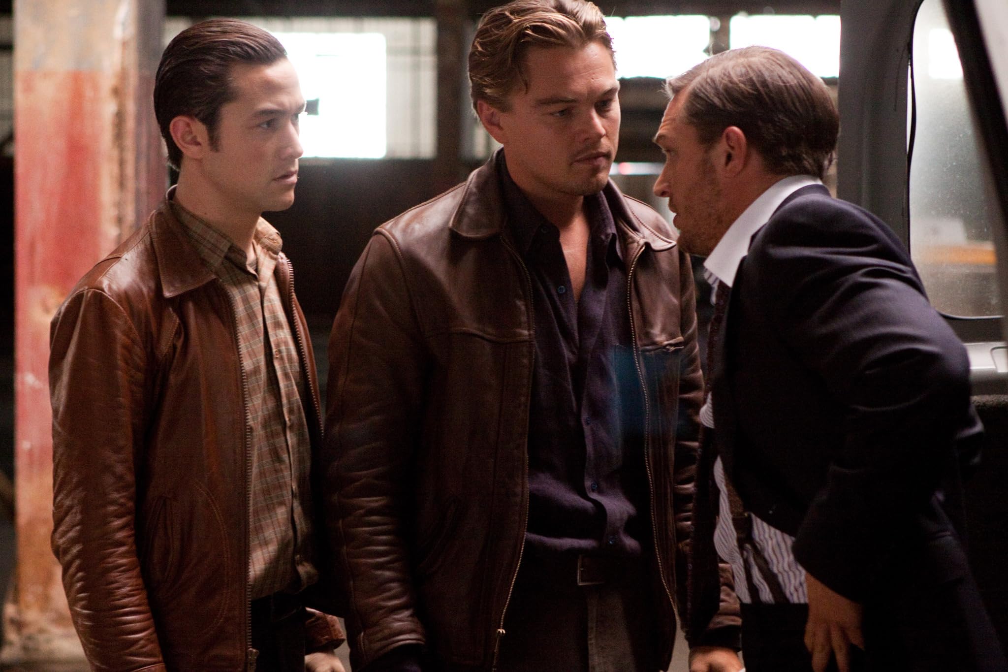The inception team moving through a hostile dreamscape environment