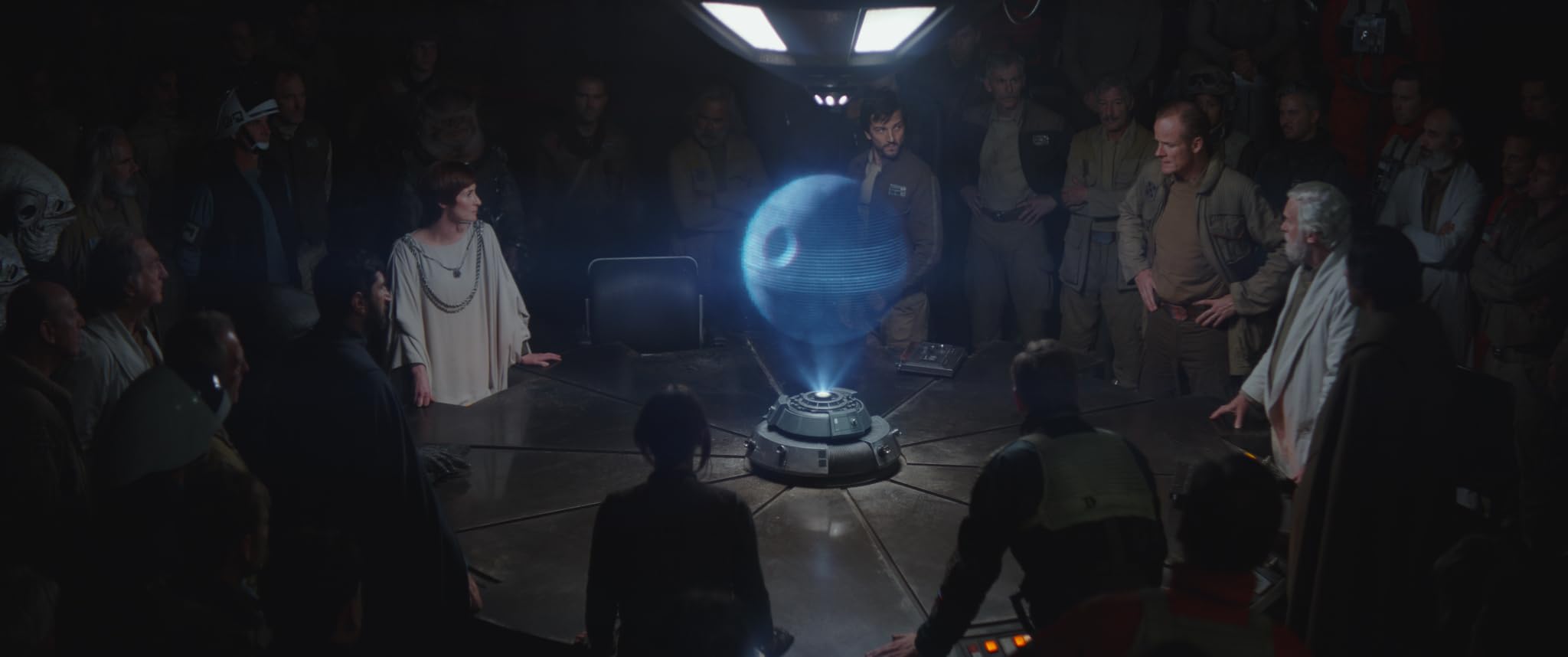 Cassian and Jyn watch as the stolen plans beam toward Mon Mothma over the Pacific.