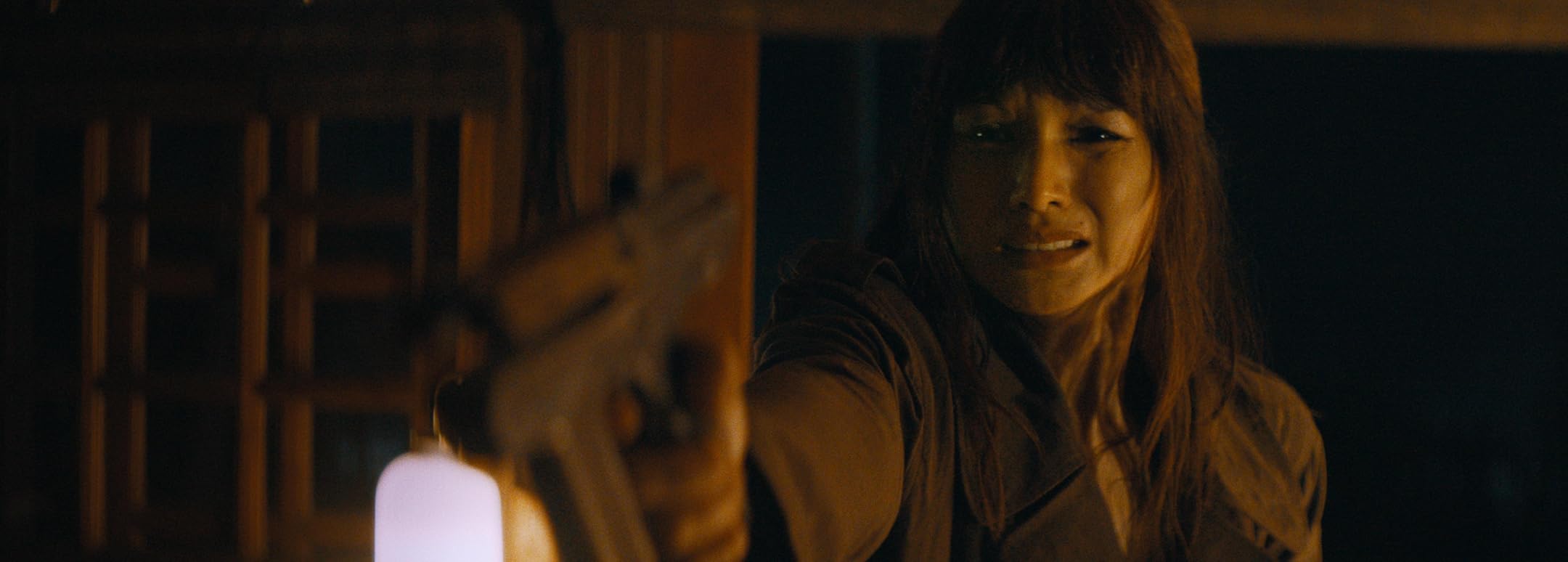The Creator still showing the future-war backdrop of the film